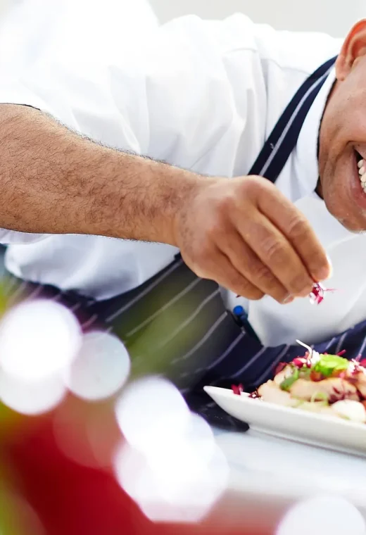 a caterer working within a care home preparing a meal