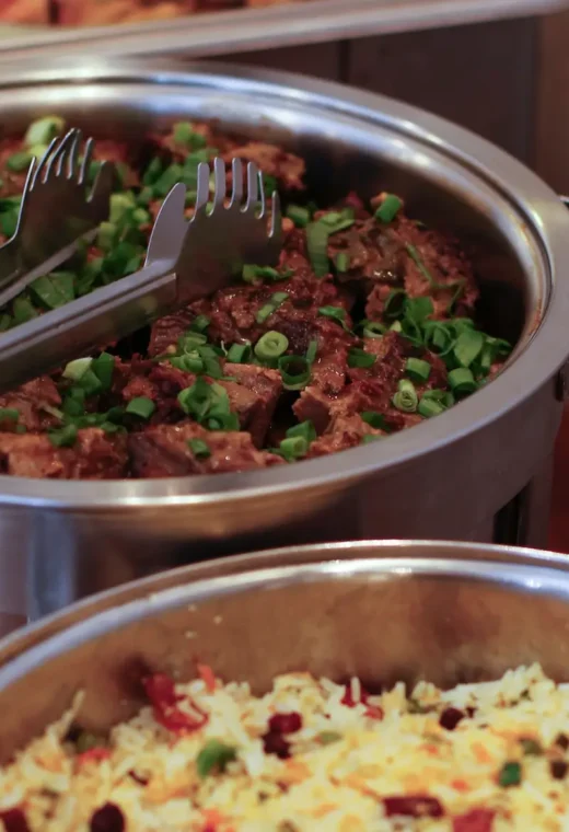 a couple of pots of food illustrating the topic about whether to start working in catering