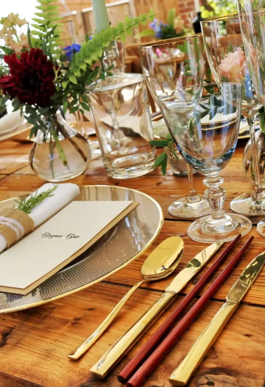 A fancy looking table laid out with fine dining ware.