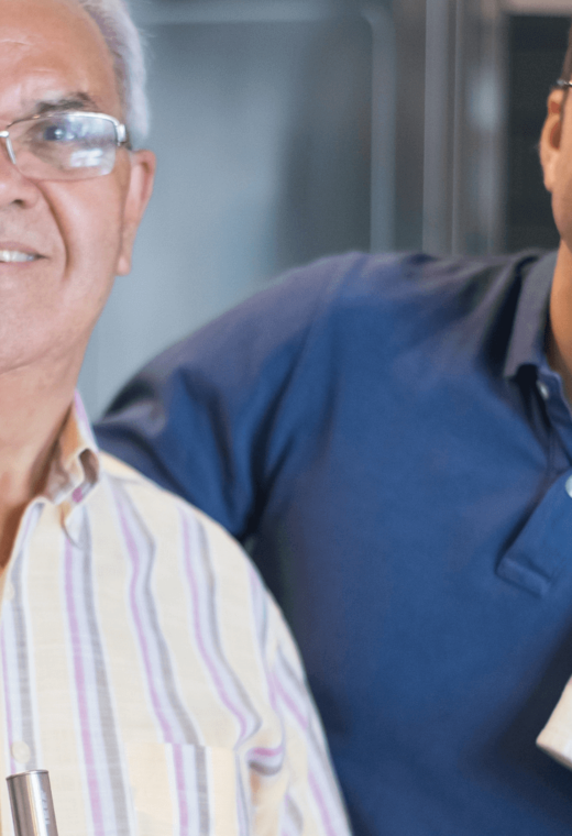 Two men looking into the camera showing the importance of healthy nutrition for seniors