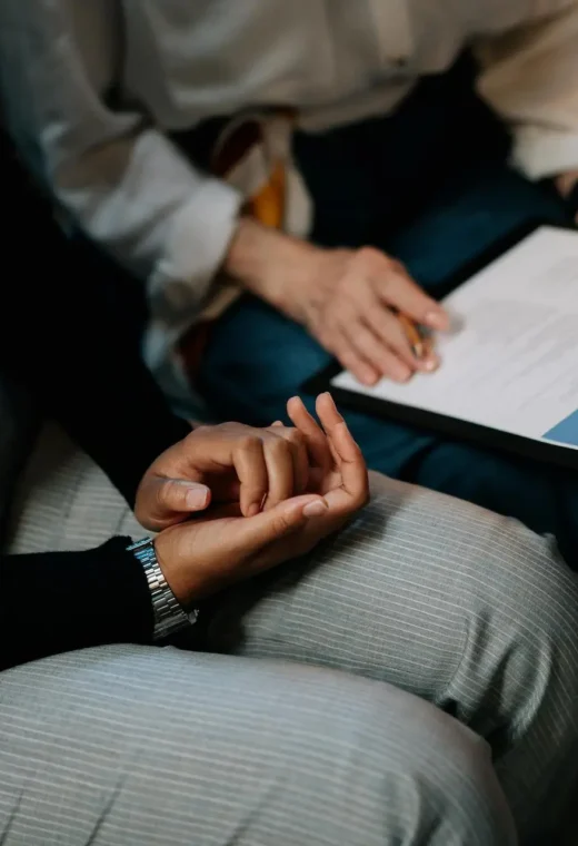 two people sat down reading over a CV